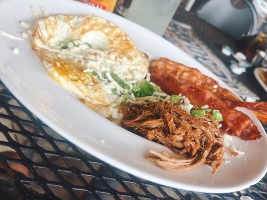 BRUNCH BOWL $9.00 CHEDDAR GRITS, TWO SUNNY SIDE UP EGGS, BACON, SCALLIONS, COTIJA CHEESE & BRISKET CHEESE STEAK SANDWICH