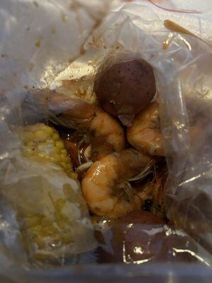 spicy garlic butter 1/2 lb head on shrimp combo