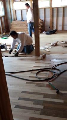 Complete Commercial Flooring lacing in the new with the old hard wood on our home renovation project!