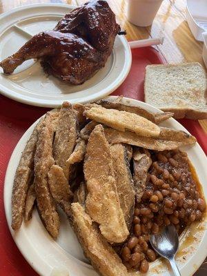 1/2 chicken with 2 sides. Normal size plates. Huge portions!