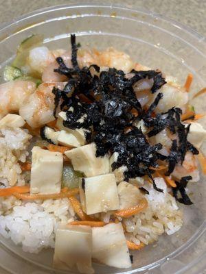 My 3y/o choice of shrimp, tofu, carrots, cucumbers, seaweed over rice and the sweet sauce.