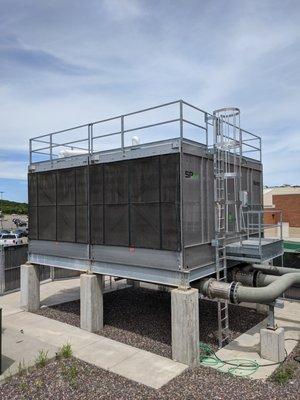 Cooling tower with special cottonwood screen protection