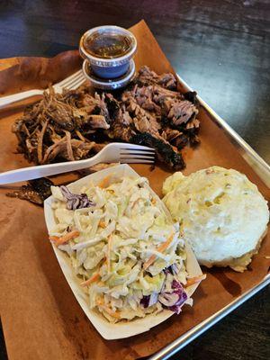 Pulled pork, brisket, coleslaw and potato salad