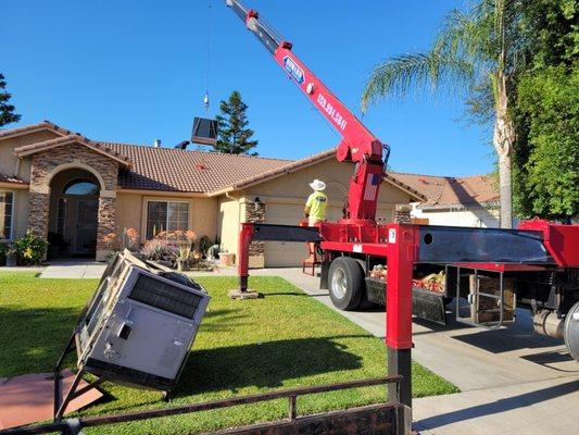 Installing a new gas package unit.