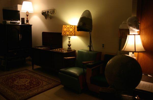 Lobby complete with 1960s hair dryers, record player, and VHS player.