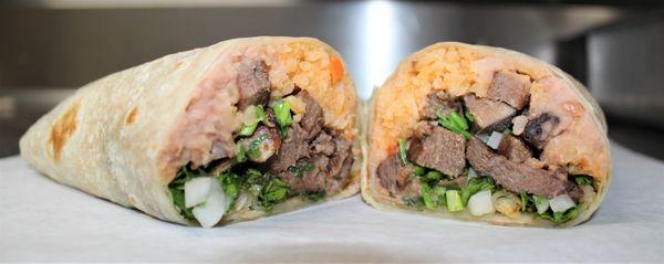 Lengua Burrito ( Cows Tounge ,Mexican Rice, Refried Pinto Beans, Cilantro and Onions)