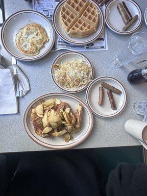 Fresh Apple French Toast, Hash Browns, Sausage Links, Belgian Waffles, Eggs- Over hard