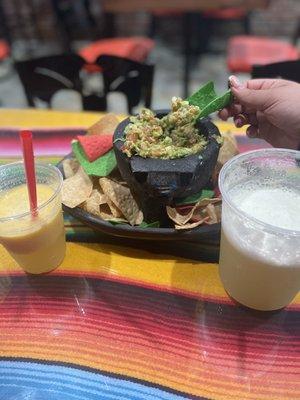 Guacamole and chips  We had the maracuya water  And the pineapple freshly made