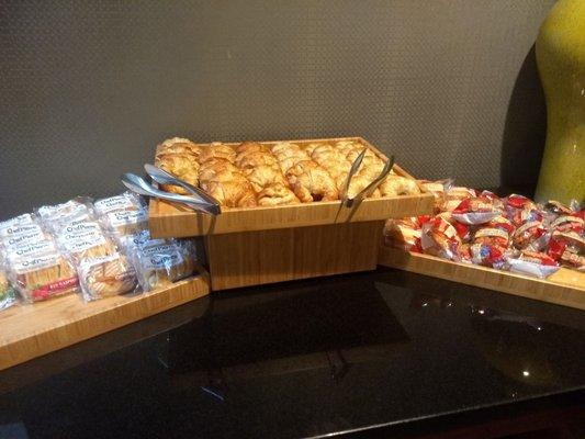 breakfast buffet, pre packaged pastries and croissants