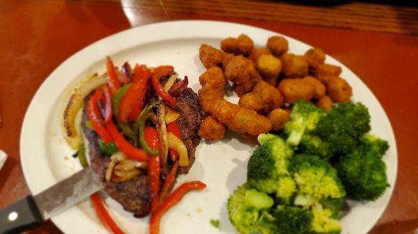 Hamburger steak with fried okra and broccoli.