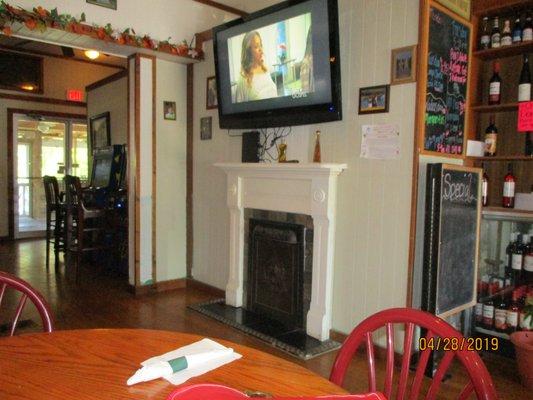 Brother's Italian Restaurant (Providence Forge): Interior: Far left, arcade games; Center, Gospel TV + faux fireplace.