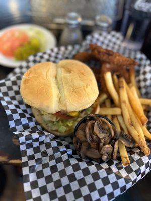 Classic Cheeseburger with a side order of Sautéed mushrooms. Hand Cut Fries and Onion rings