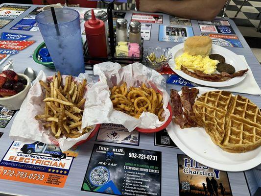 Fruit cup, fries, curly fries, waffle, bacon and the big8 plate