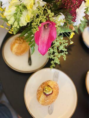 Raspberry pistachio bomboloni.