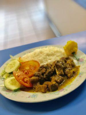 Curry Goat w/ White Rice + Side Salad