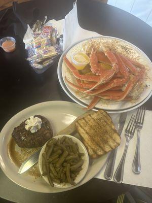 Crab legs with corn, sausage, and potatoes.  6 oz aged filet with green beans and toast