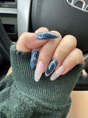 Silver  and midnight blue  nails with moon and star accents