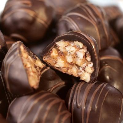 Texas Snowballs - Praline Pecan Pie filling coated in premium dark chocolate. In sweet or hot versions. www.puddinhill.com