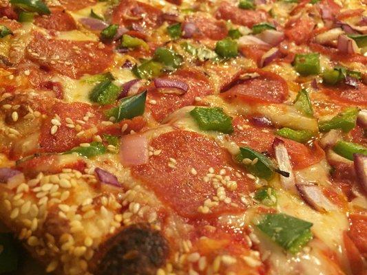 Large with Pepperoni, onions and green peppers. Sesame seed crust.