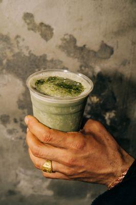 Matcha Nice Cream smoothie with your choice of milk, bananas, matcha, adaptogens, vanilla, rose, and dates