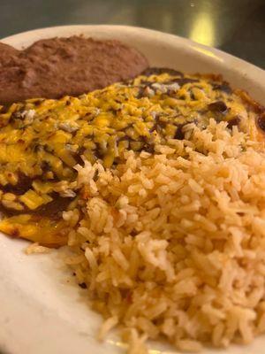 Cheese enchiladas, rice and refried beans