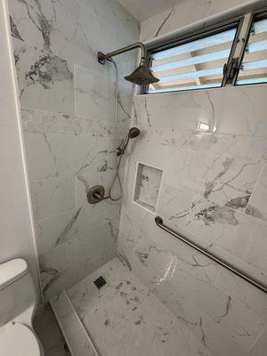 Tub to walk in shower transformation.