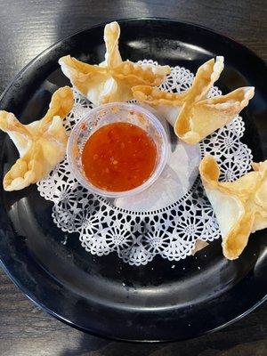 Crab rangoons but they call them something else.