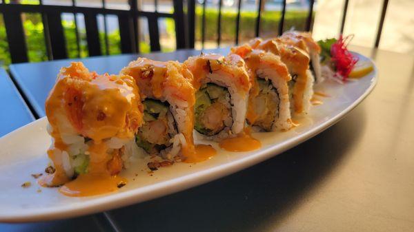 My fair lady Roll,  shrimp Tempura ,avocado,Cucumber inside with fried Japanese crab stick on top.