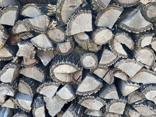 There's so many different kinds of wood stacked up into walls. It was so nice to see the difference in them and the art of their BBQ.