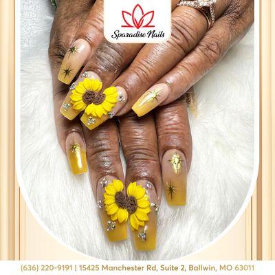 Bring a touch of sunshine to your fingertips with our vibrant sunflower nail art.