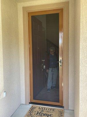 Custom brown color. Hinged security screen door. No bugs, no thief's, fresh air with full visibility.