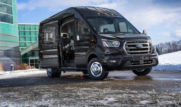 large shuttle Black Transit Van (15 passengers)