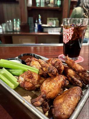 Smoked wings with BBQ sauce on the side