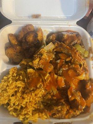 Goat, Collard Greens, Plantains and Yellow Rice