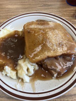 Roast beef sandwich with brown gravy