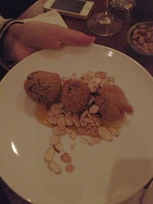 Chocolate croquettes with passion fruit and shaved almonds