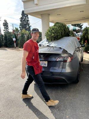 Peter was very helpful in attaching the tree to our car