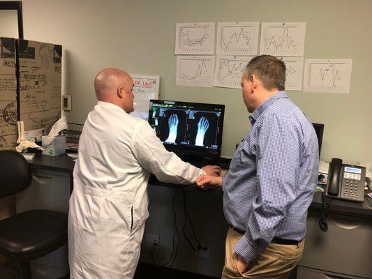 Dr. Mckee & Dr. Lind reviewing x-ray findings.