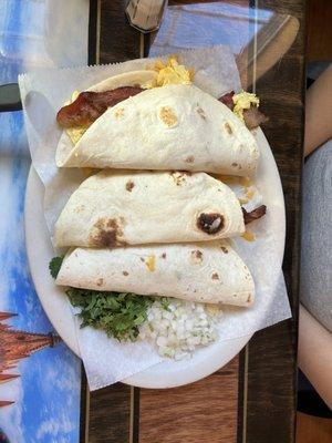 Bacon egg and cheese, and 1 Barbacoa taco