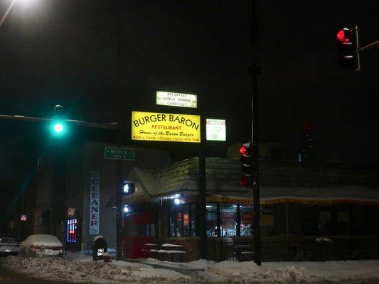 A wintry evening storefront view.