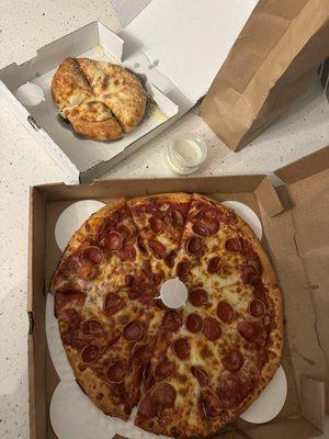 9/12/2024 - Large 1 topping Spicy Pepperoni and cheese pizza. Small Cheese Bread.  Side of ranch (included 2)