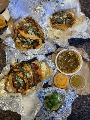 Al pastor taco too left, asada taco top right, BIRRIA bottom left