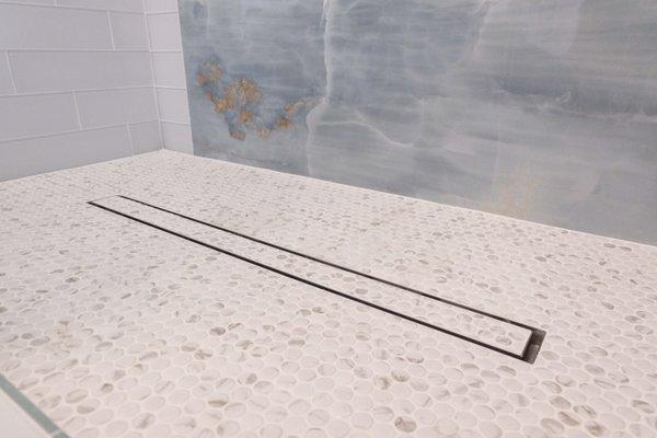 Tiled drain in the master shower