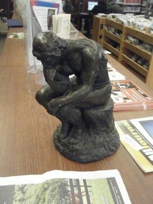 The Thinker.  Actually ruminating over just being condemned to hell.