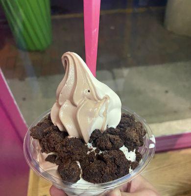 Single swirl (vanilla and chocolate) in a dish with brownie pieces