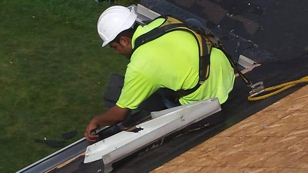 Jacob installing Gutters in Channahon, IL. July 2015