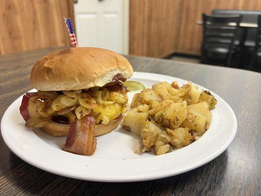 Zach and cheese burger with home fries