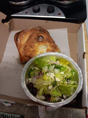 Half Stromboli and half shall Greek salad!