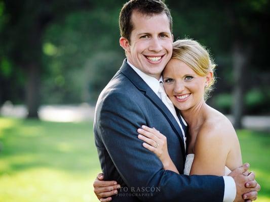 Awesome wedding couple  embracing each other at The Brookfield Zoo.