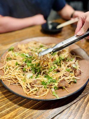 Stir fried beef brisket and mung bean sprouts